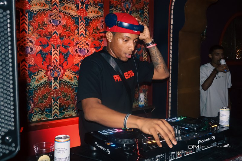 DJ working at the mixing desk
